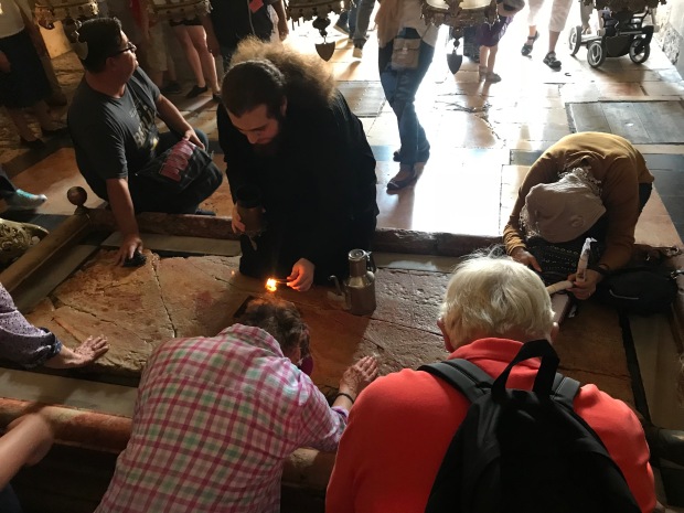 When Jesus was taken down from the cross, this is the slab that he was laid on before he was taken and buried in the Tomb.